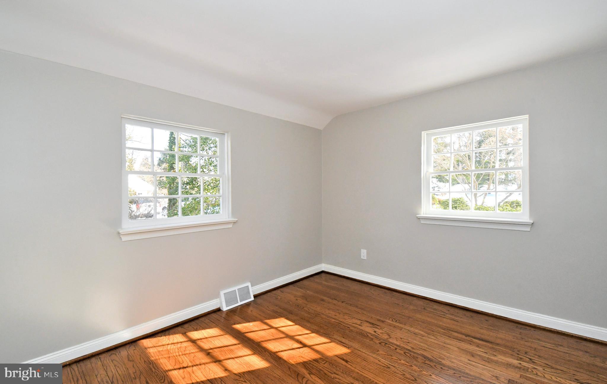 457 School House Lane Devon, PA 19333 - Photo 56 of 93 a view of an empty room with wooden floor and a window