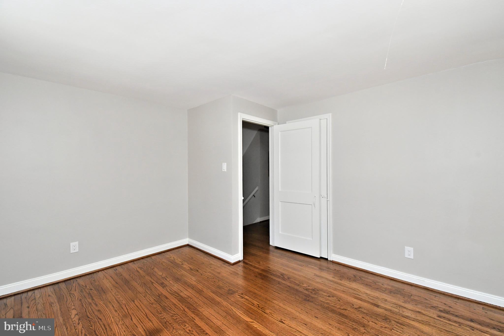 457 School House Lane Devon, PA 19333 - Photo 58 of 93 a view of an empty room with wooden floor and closet