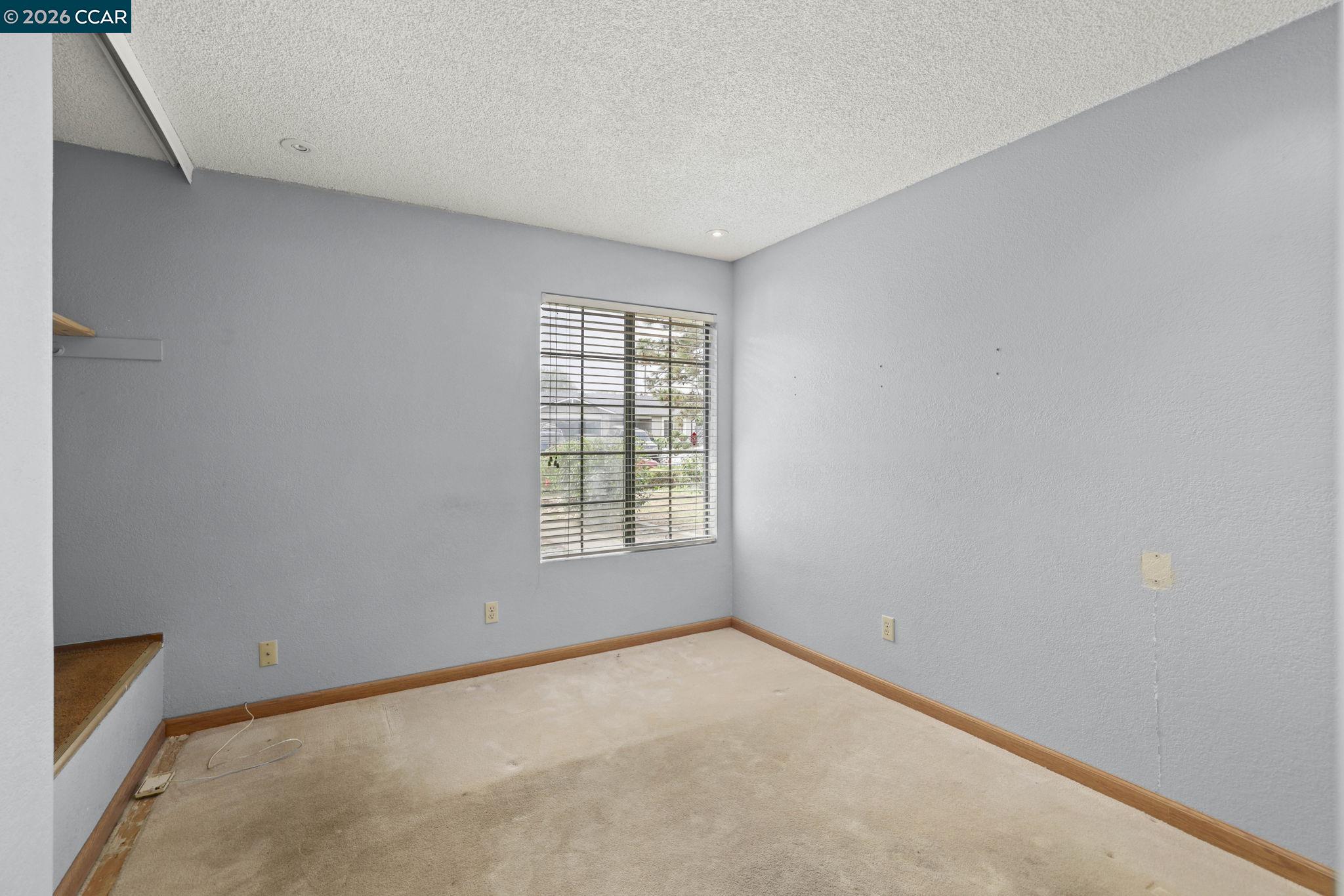 3438 Gregory Drive Bay Point, CA 94565 - Photo 13 of 24 a view of an empty room with a window