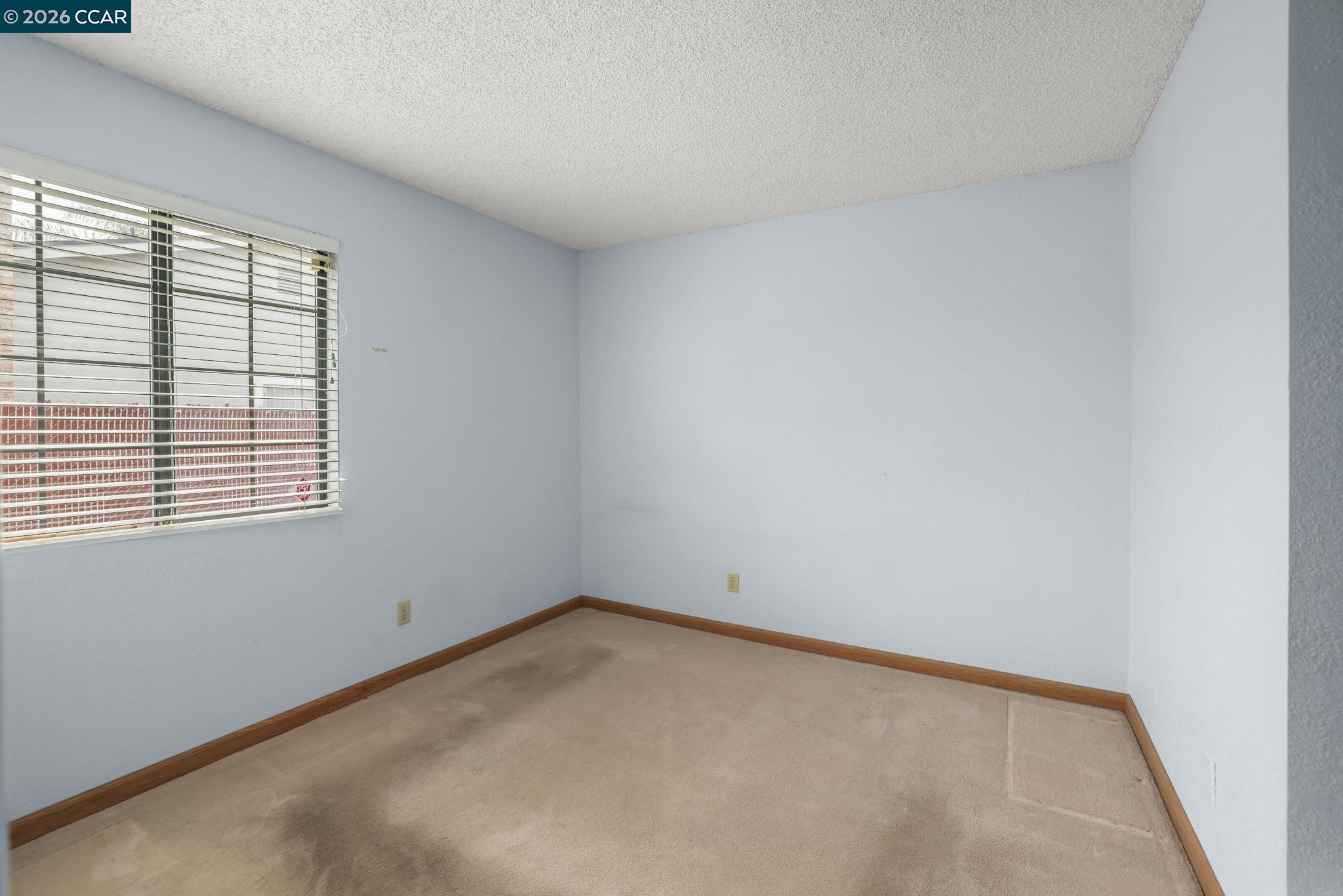 3438 Gregory Drive Bay Point, CA 94565 - Photo 15 of 24 an empty room with a window