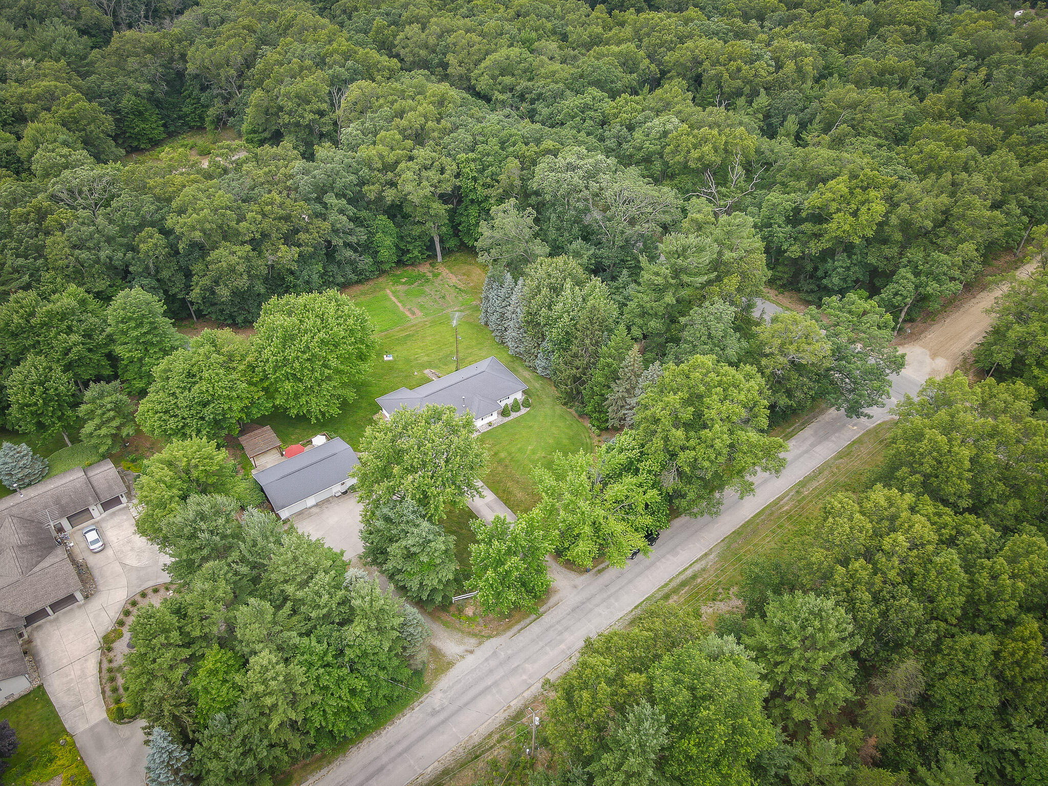 3767 Jay Road Whitehall, MI 49461 - Photo 6 of 63 dji_fly_20240628_103546_130_171958544021