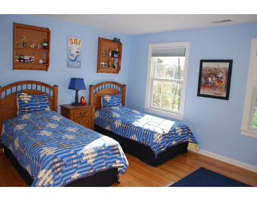 3 Marlboro Road Lexington, MA 02421 - Photo 15 of 18 a bedroom with two beds and a window