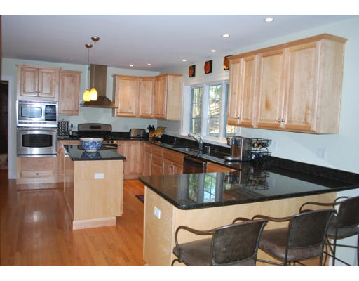 3 Marlboro Road Lexington, MA 02421 - Photo 5 of 18 a kitchen with stainless steel appliances granite countertop a sink a stove counter space and cabinets