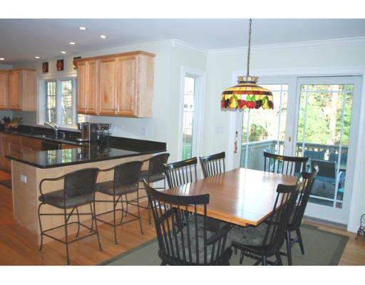 3 Marlboro Road Lexington, MA 02421 - Photo 7 of 18 a view of a dining room with furniture a chandelier and wooden floor