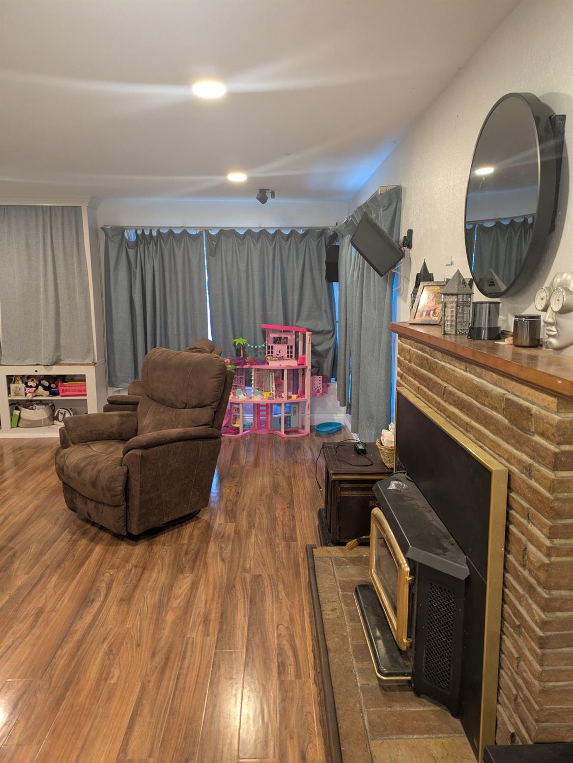 25931 Thornton Road Thornton, CA 95686 - Photo 7 of 31 a living room with furniture and a wooden floor