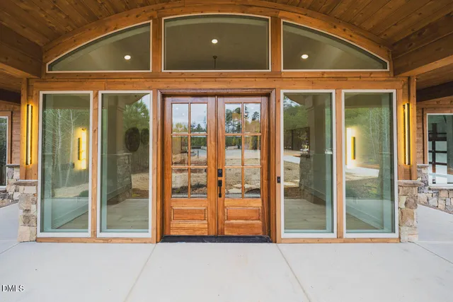 a stove top oven sitting inside of a kitchen
