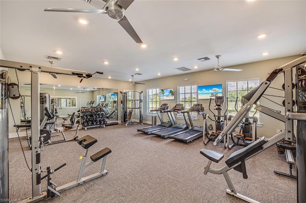 15535 Wildflower Circle Naples, FL 34119 - Photo 28 of 33 a view of a room with gym equipment