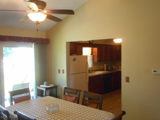8560 Royal Ridge Drive Parma, OH 44129 - Photo 10 of 21 The dining room has a vaulted ceiling and a sliding door leading to a large deck. The dining room opens to a totally updated kitchen!