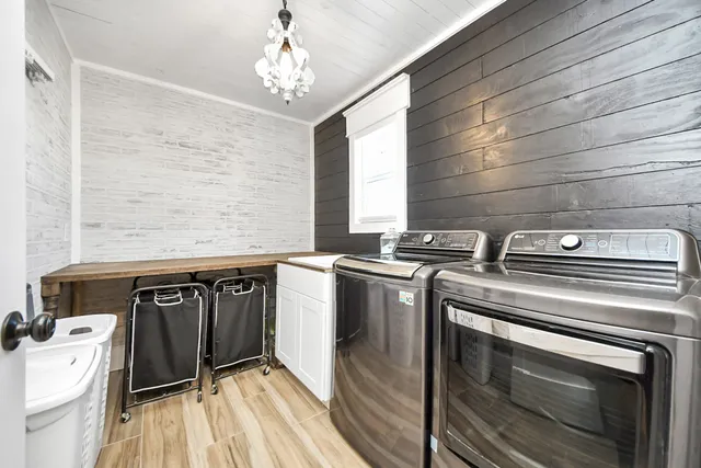 a utility room with washer and dryer