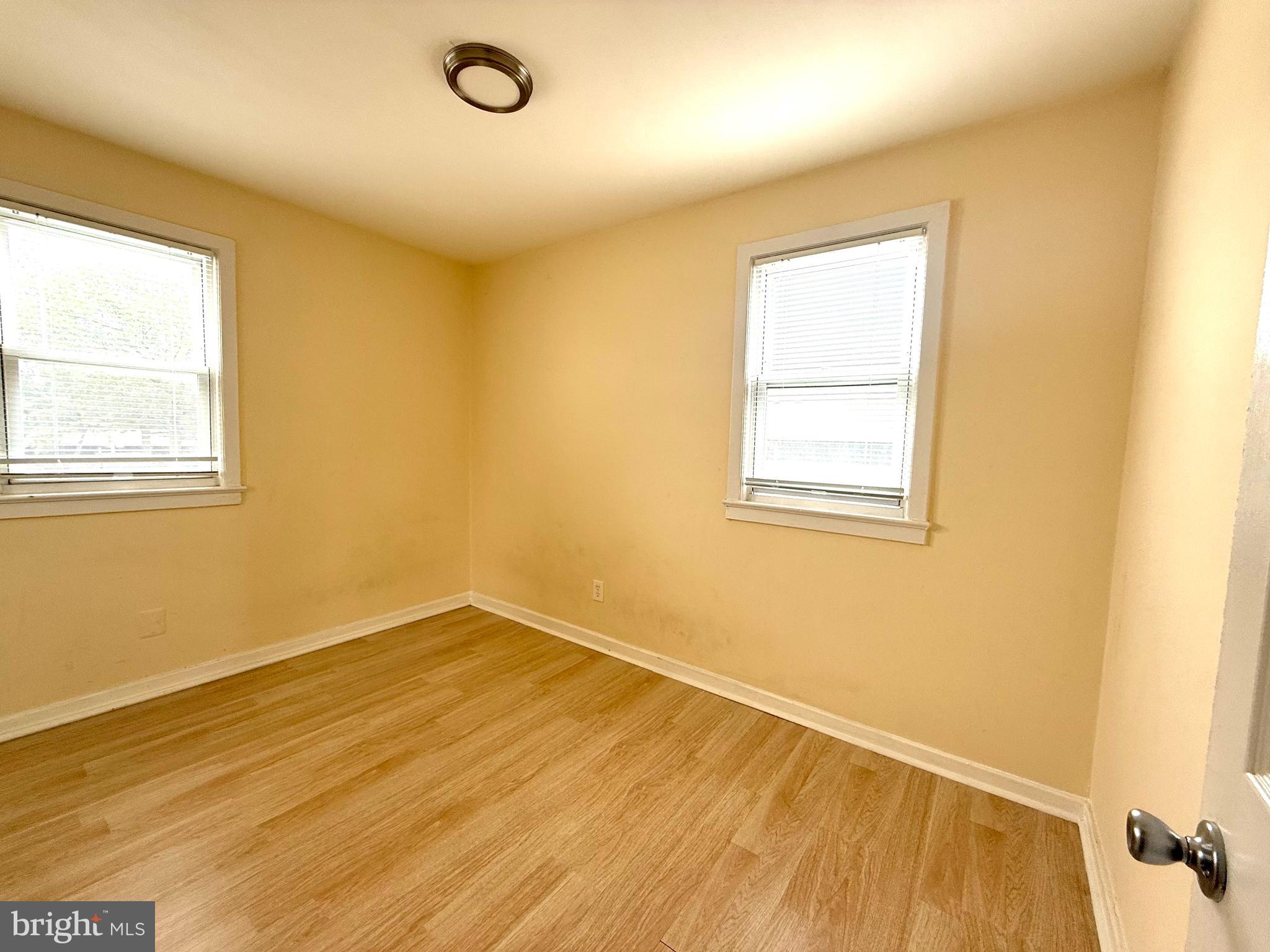 2852 Iverson Street, Unit 110 Temple Hills, MD 20748 - Photo 13 of 23 an empty room with a window
