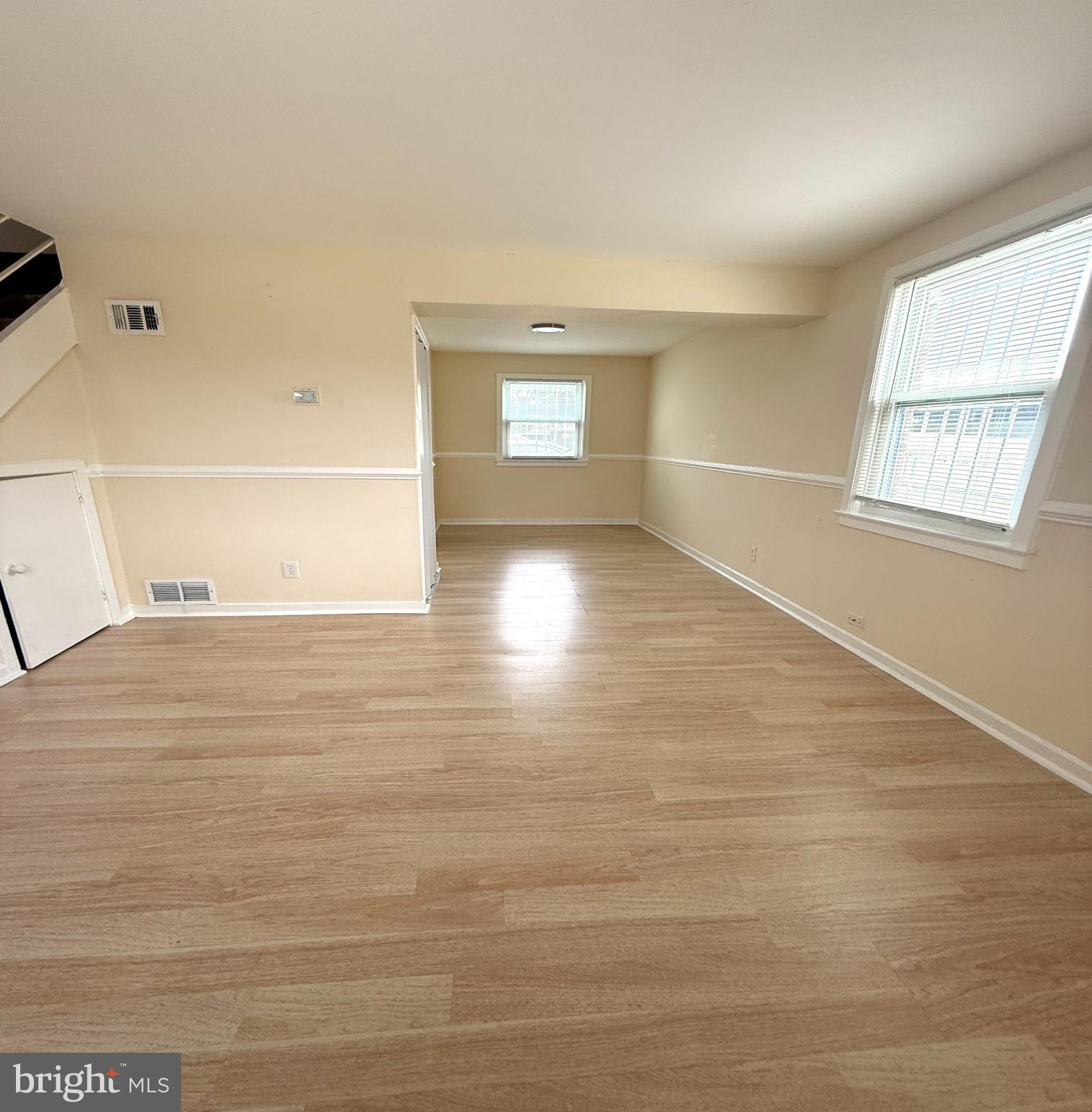 2852 Iverson Street, Unit 110 Temple Hills, MD 20748 - Photo 8 of 23 a view of an empty room and window