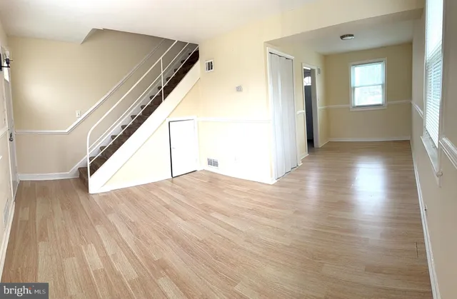 a view of livingroom with furniture and wooden floor