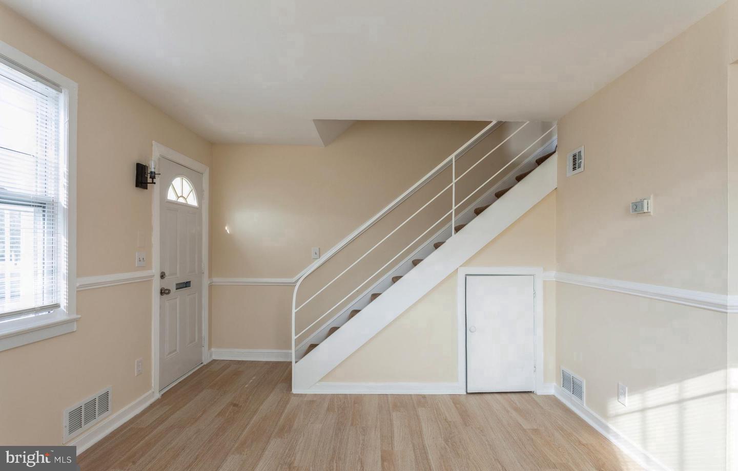 2852 Iverson Street, Unit 110 Temple Hills, MD 20748 - Photo 10 of 23 a view of an entryway with wooden floor