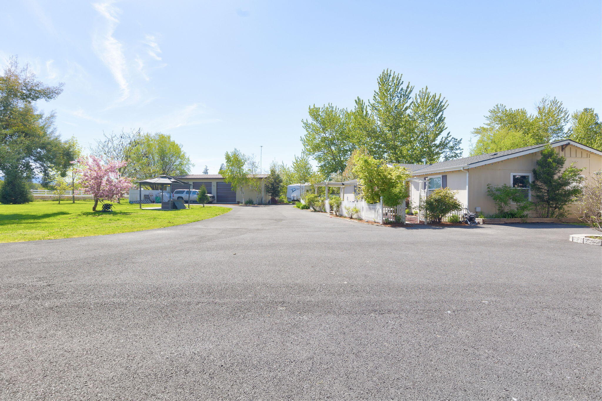3798 Leonard Road Grants Pass, OR 97527 - Photo 54 of 62 a view of a house with outdoor space and yard