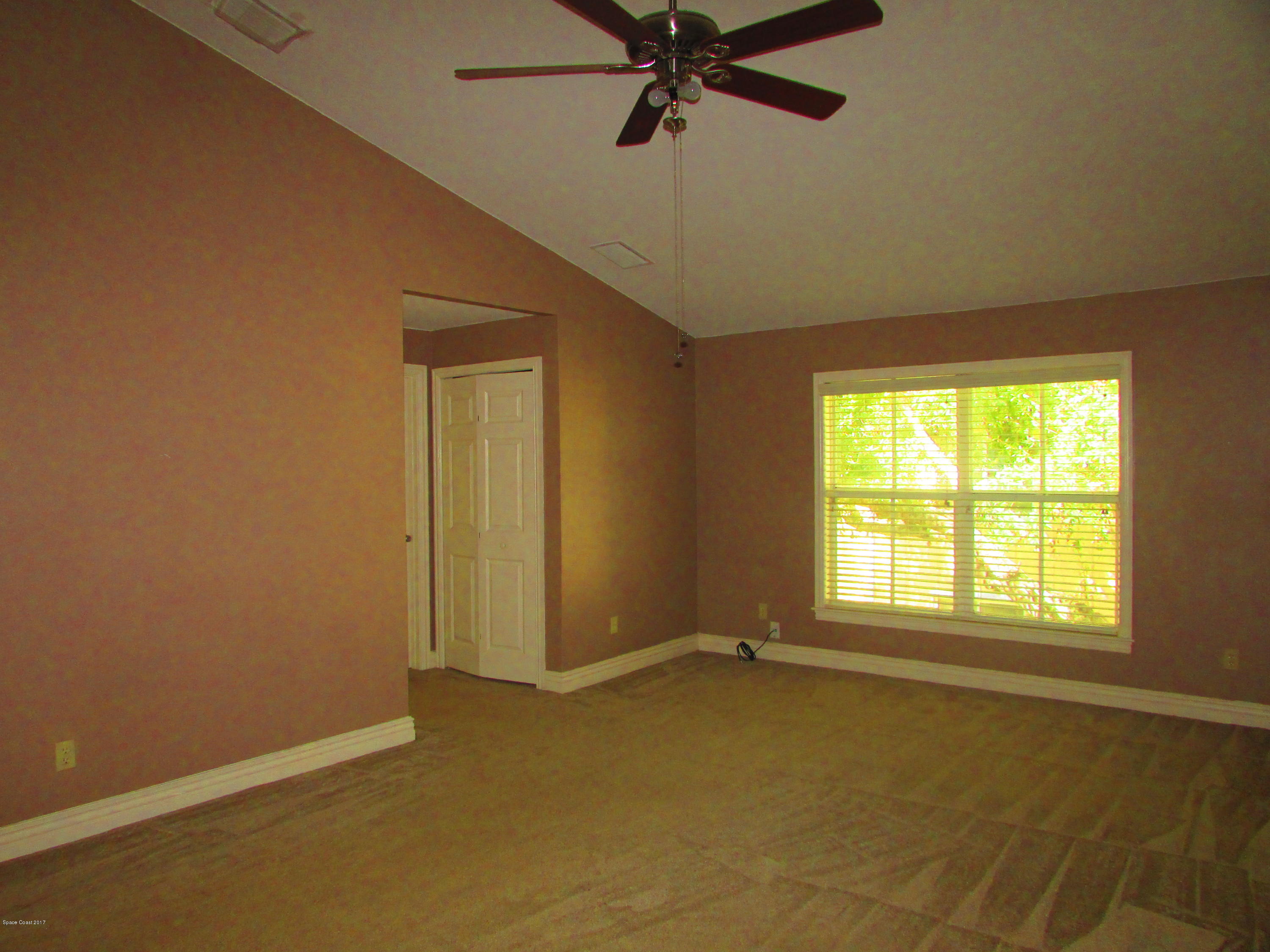 629 Cedar Side Circle Northeast Palm Bay, FL 32905 - Photo 8 of 12 Master Bedroom