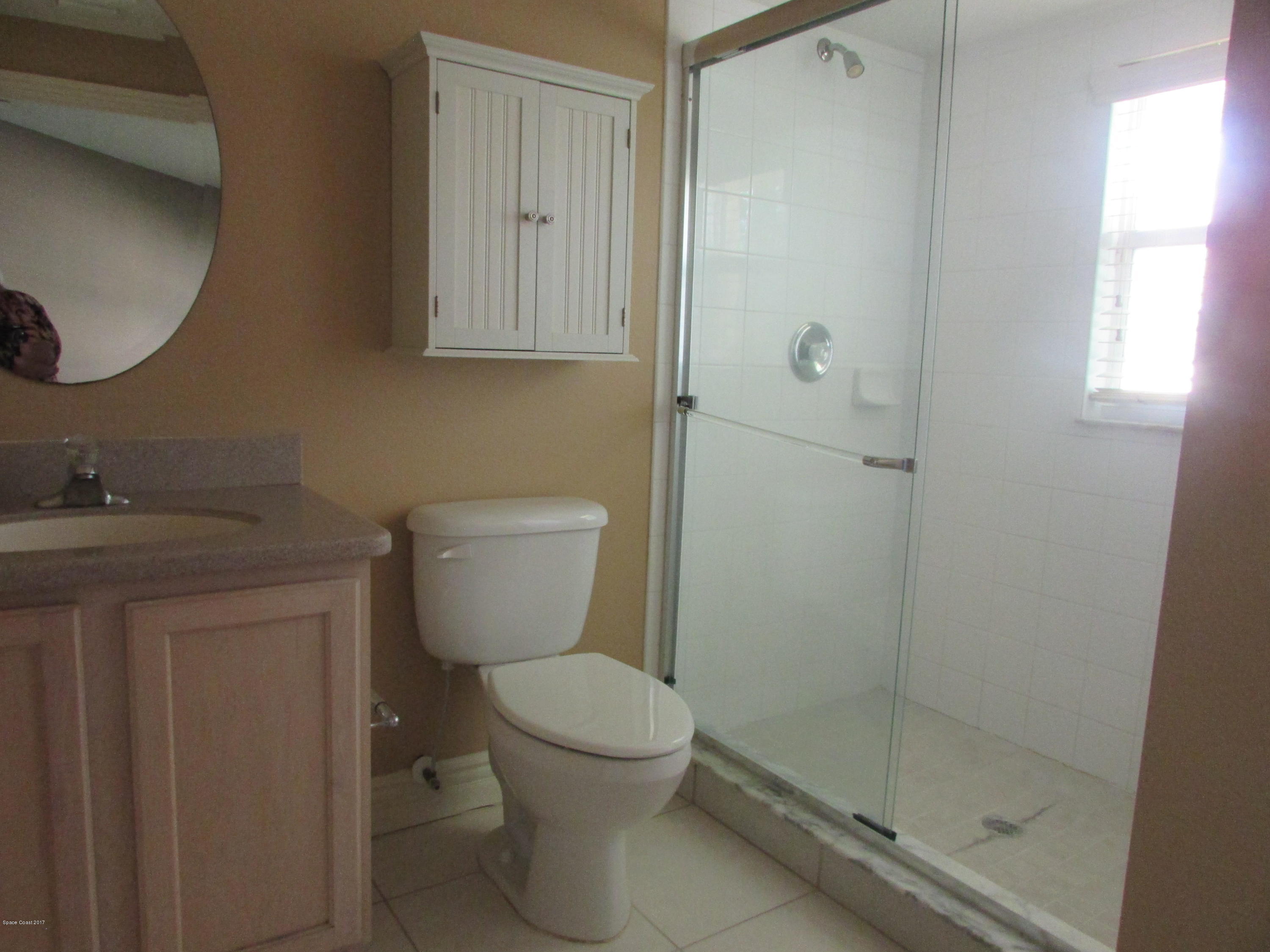 629 Cedar Side Circle Northeast Palm Bay, FL 32905 - Photo 9 of 12 Master Bedroom Shower