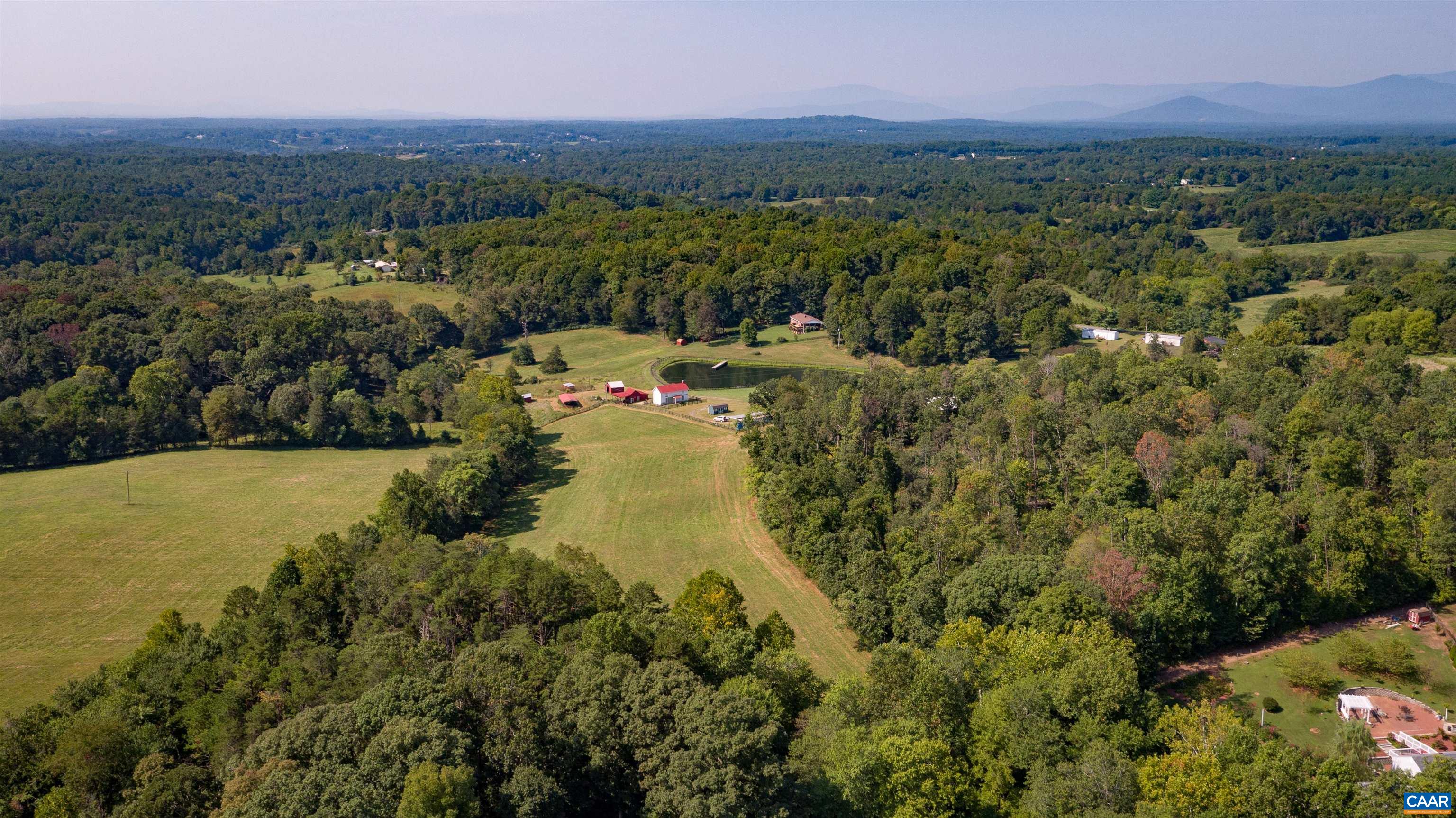 Tm 65-a-23 Tm 65-a-23 Gilbert Road Ruckersville, VA 22968 - Photo 3 of 10 a view of a town with mountains in the background