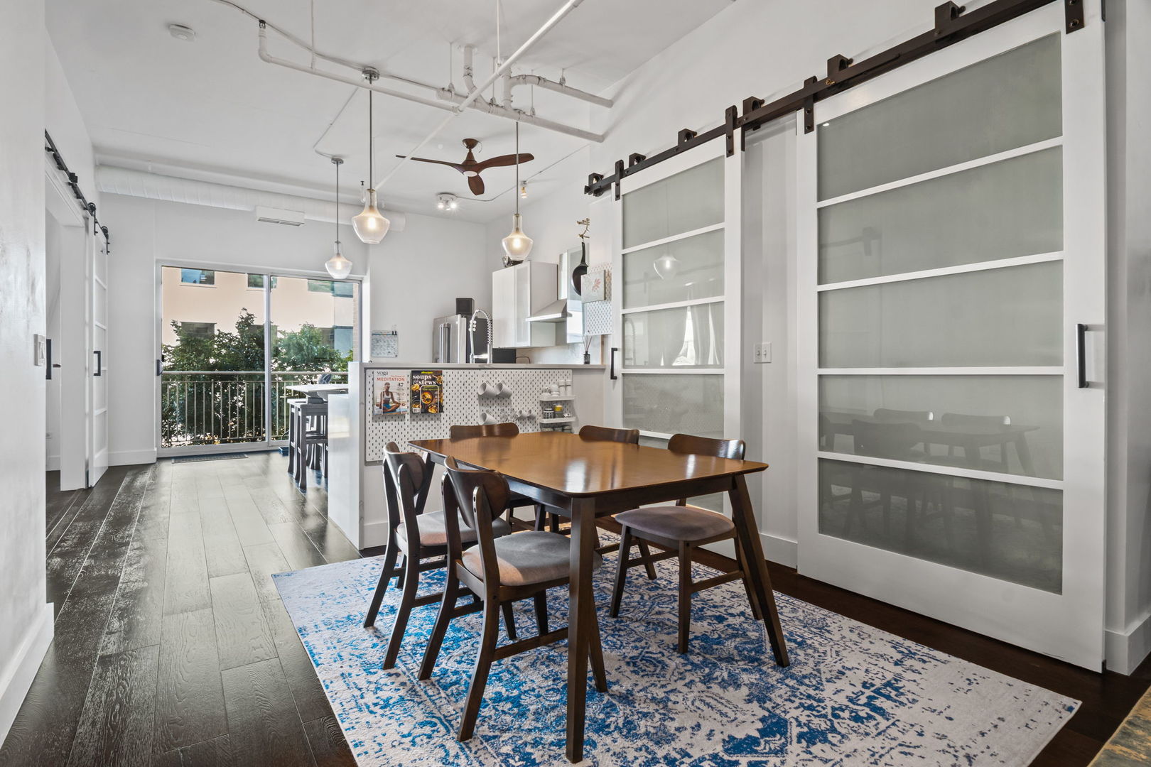 1640 Maple Avenue, Unit 304 Evanston, IL 60201 - Photo 2 of 25 a view of a dining room with furniture and wooden floor