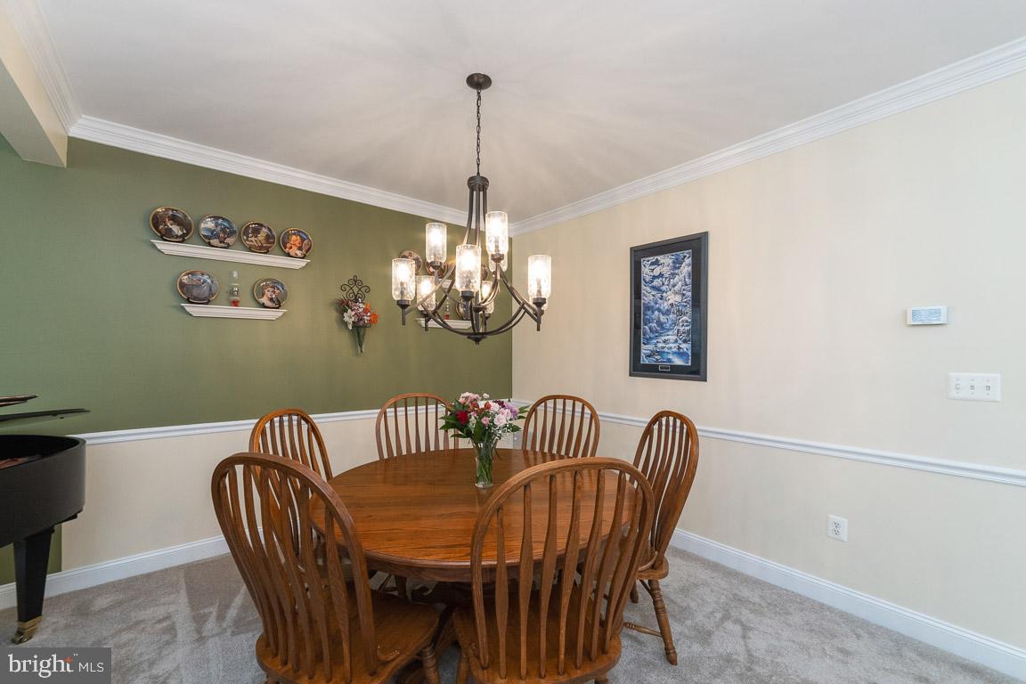 681 Springhouse Square Southeast Leesburg, VA 20175 - Photo 11 of 50 Dining room w/ new carpet