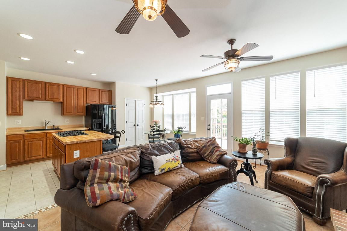 681 Springhouse Square Southeast Leesburg, VA 20175 - Photo 12 of 50 Beautiful family room open to the kitchen