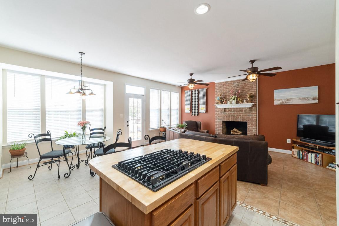681 Springhouse Square Southeast Leesburg, VA 20175 - Photo 13 of 50 New cooktop & gleaming wood counters