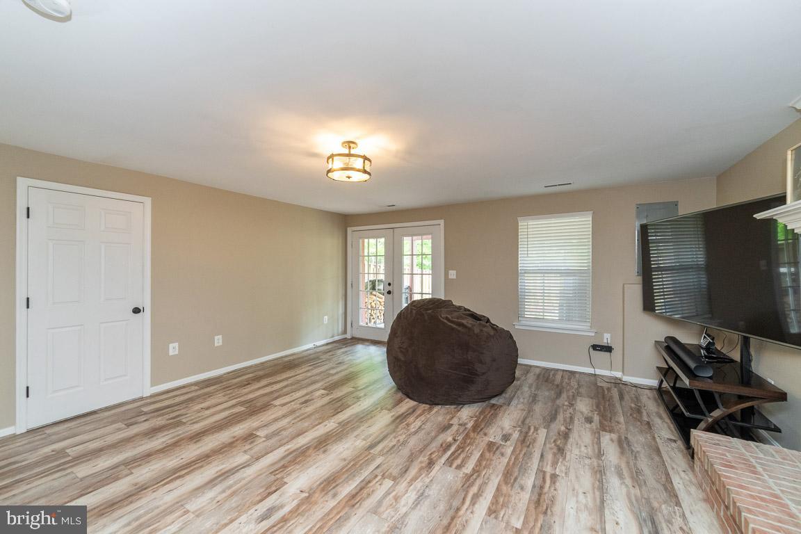 681 Springhouse Square Southeast Leesburg, VA 20175 - Photo 29 of 50 Rec room w/ french doors to rear patio