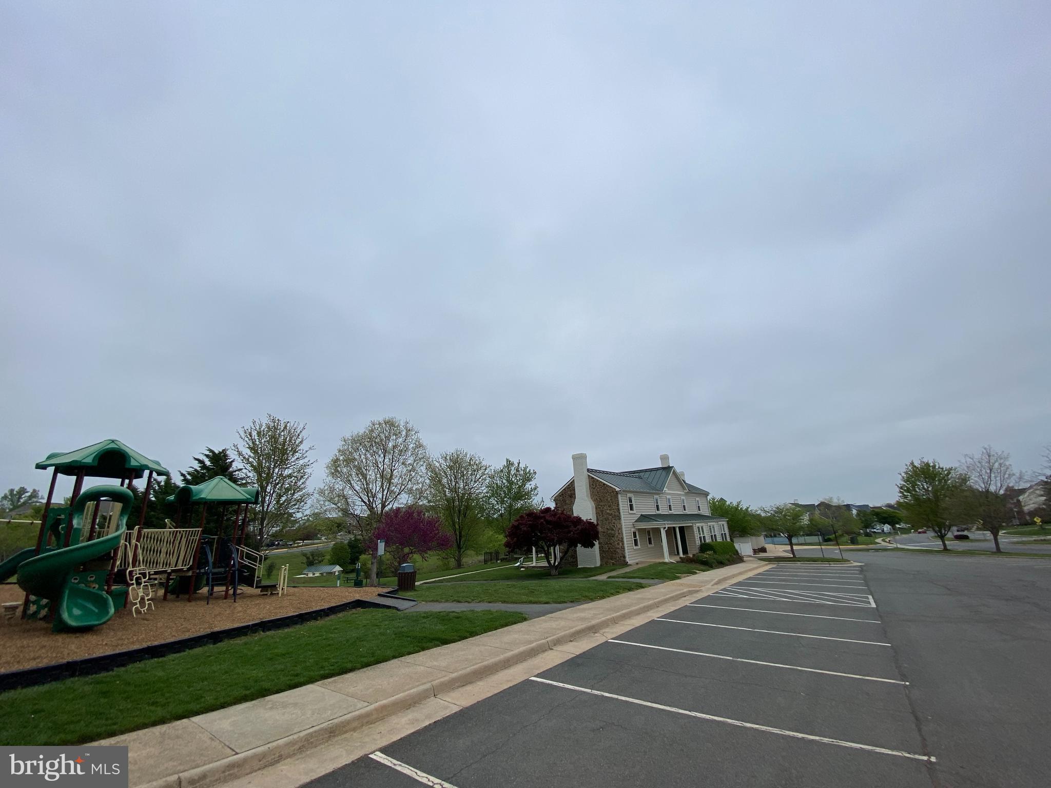 681 Springhouse Square Southeast Leesburg, VA 20175 - Photo 47 of 50 Tot lot and community farm house