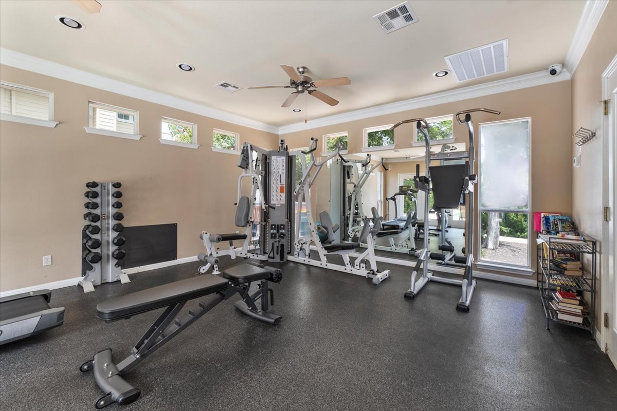 11000 Anderson Mill Road, Unit 11 Austin, TX 78750 - Photo 32 of 34 Achieve peak fitness in this well-appointed gym with resilient flooring and abundant natural light.