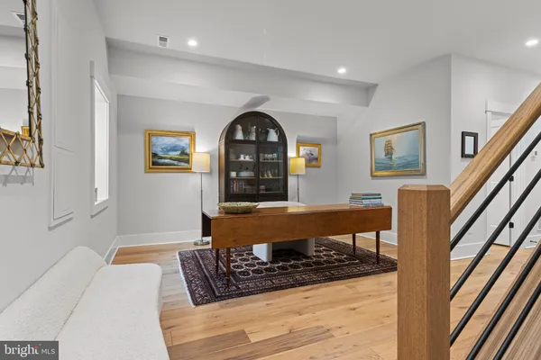 a view of a floor to ceiling window and wooden floor