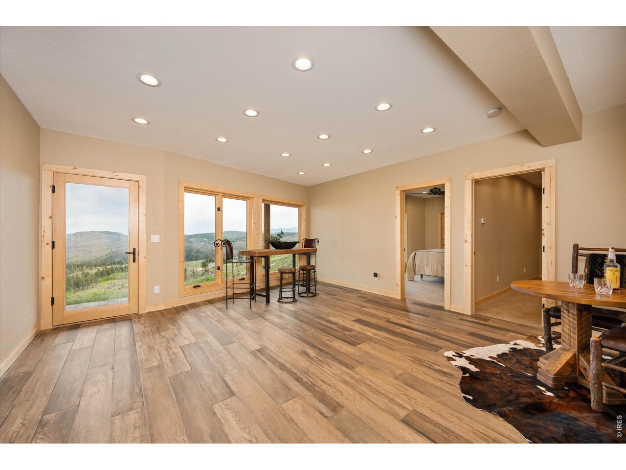 4119 Davis Ranch Road Bellvue, CO 80512 - Photo 33 of 47 Spacious Walk-out basement family room
