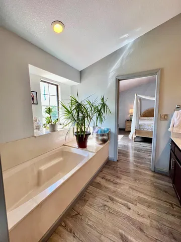 a view of a living room and hardwood floor