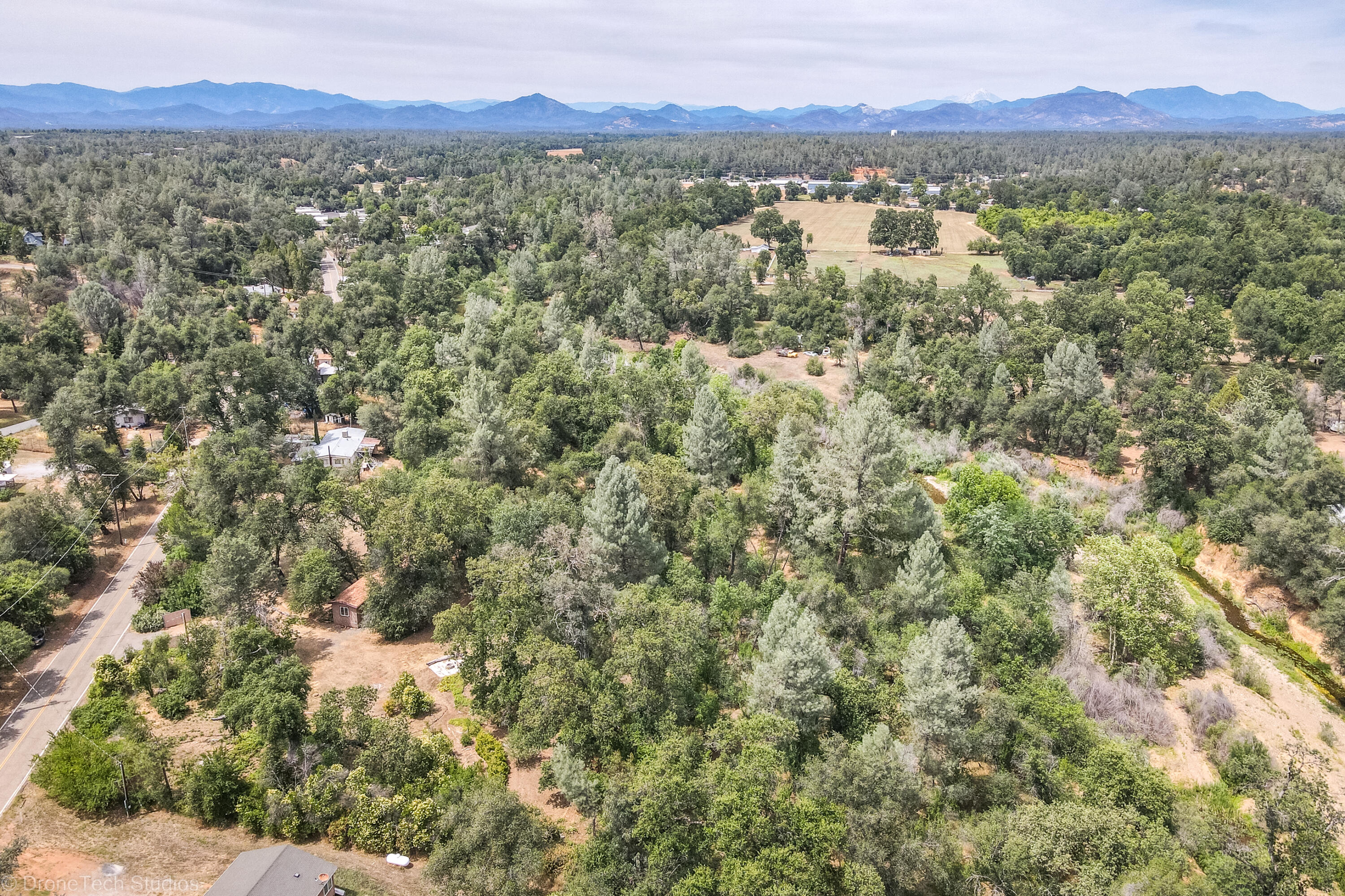9983 Harley Leighton Road Redding, CA 96003 - Photo 35 of 58 Road on left, creek on right