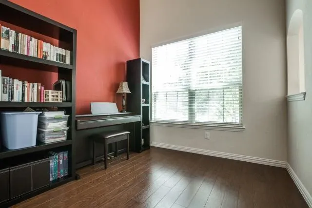a living room with furniture fireplace and flat screen tv