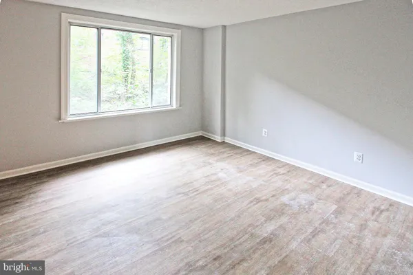 a bathroom with a toilet a sink and bathtub