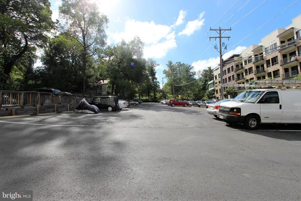 a view of a house with backyard and garden