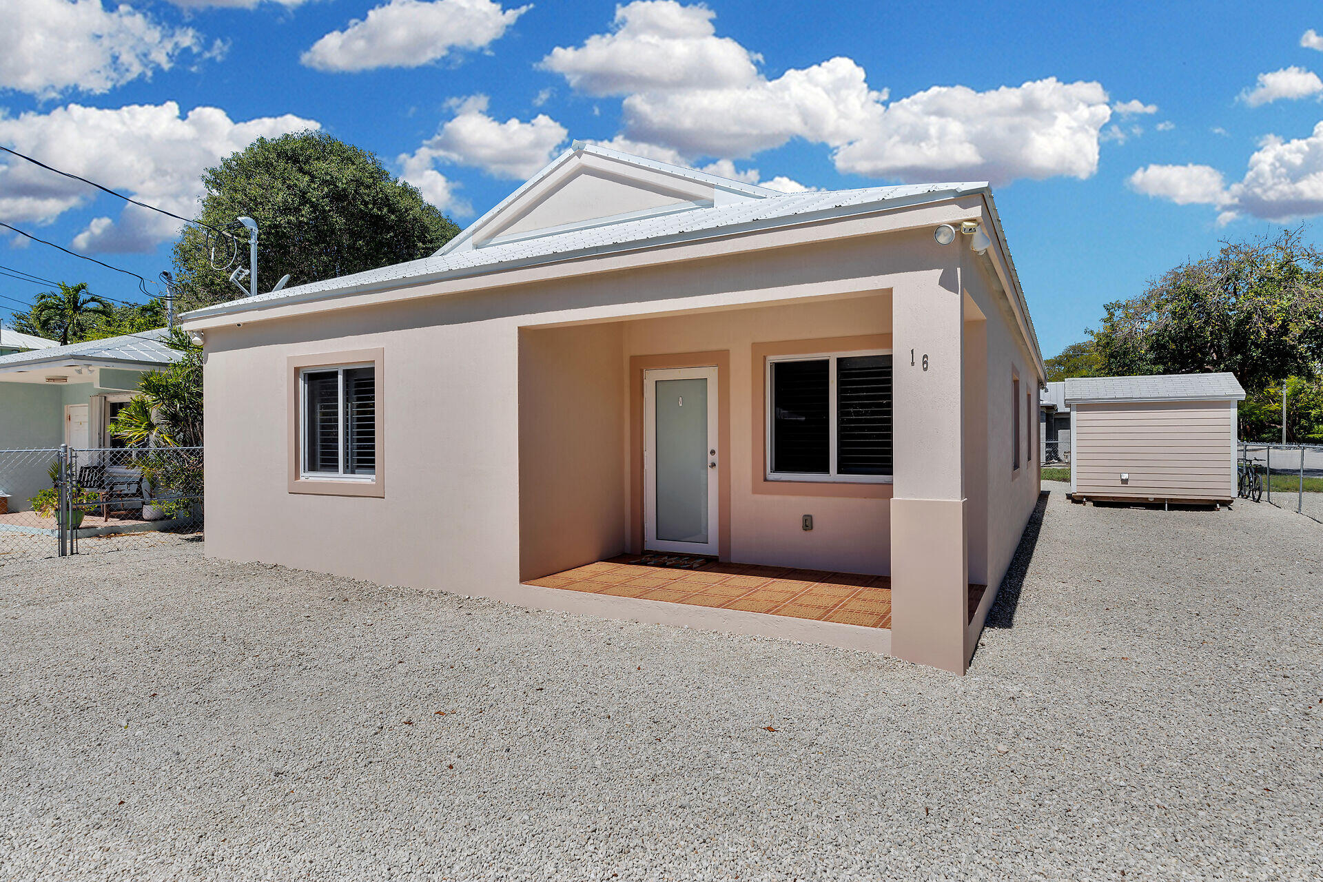 a view of a house with a roof deck