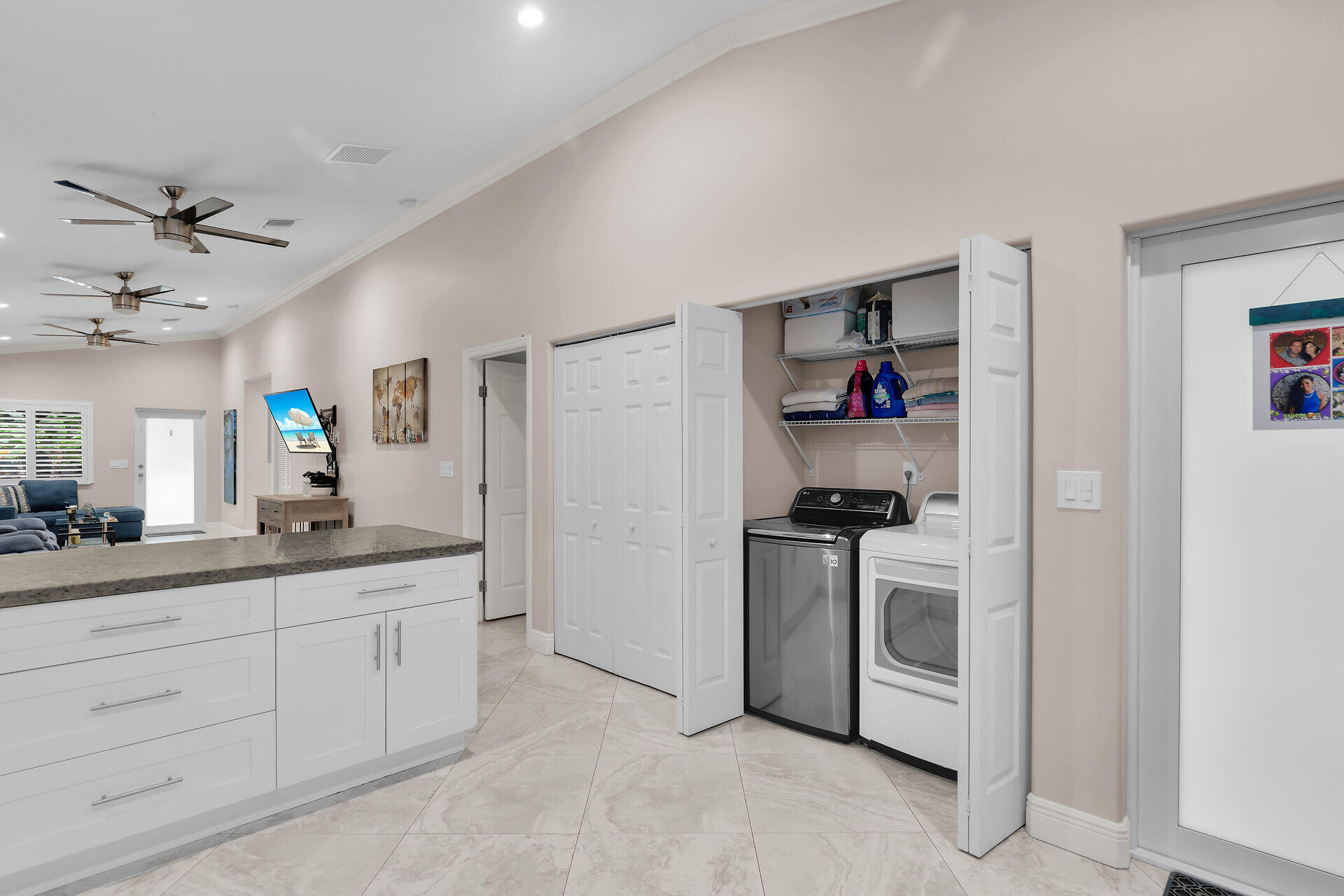 16 Jewfish Avenue Key Largo, FL 33037 - Photo 18 of 69 a kitchen with stainless steel appliances granite countertop a sink and cabinets