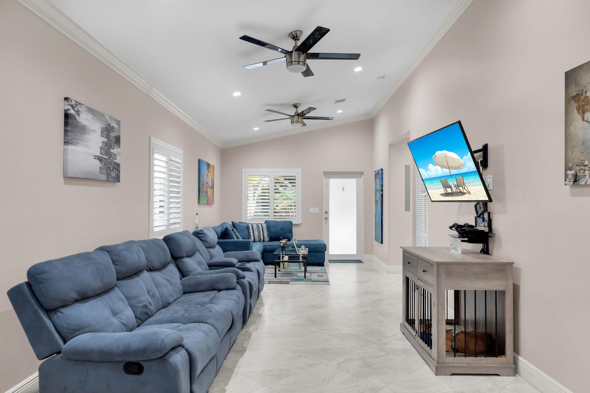 16 Jewfish Avenue Key Largo, FL 33037 - Photo 24 of 69 a living room with furniture a chandelier and a fireplace