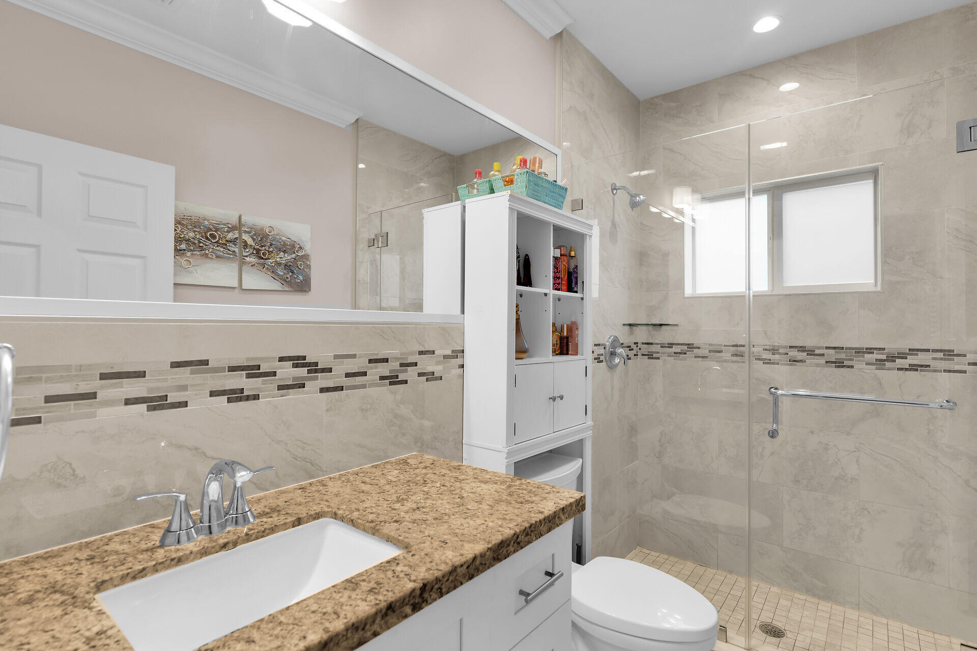 16 Jewfish Avenue Key Largo, FL 33037 - Photo 28 of 69 a bathroom with a granite countertop sink toilet and shower