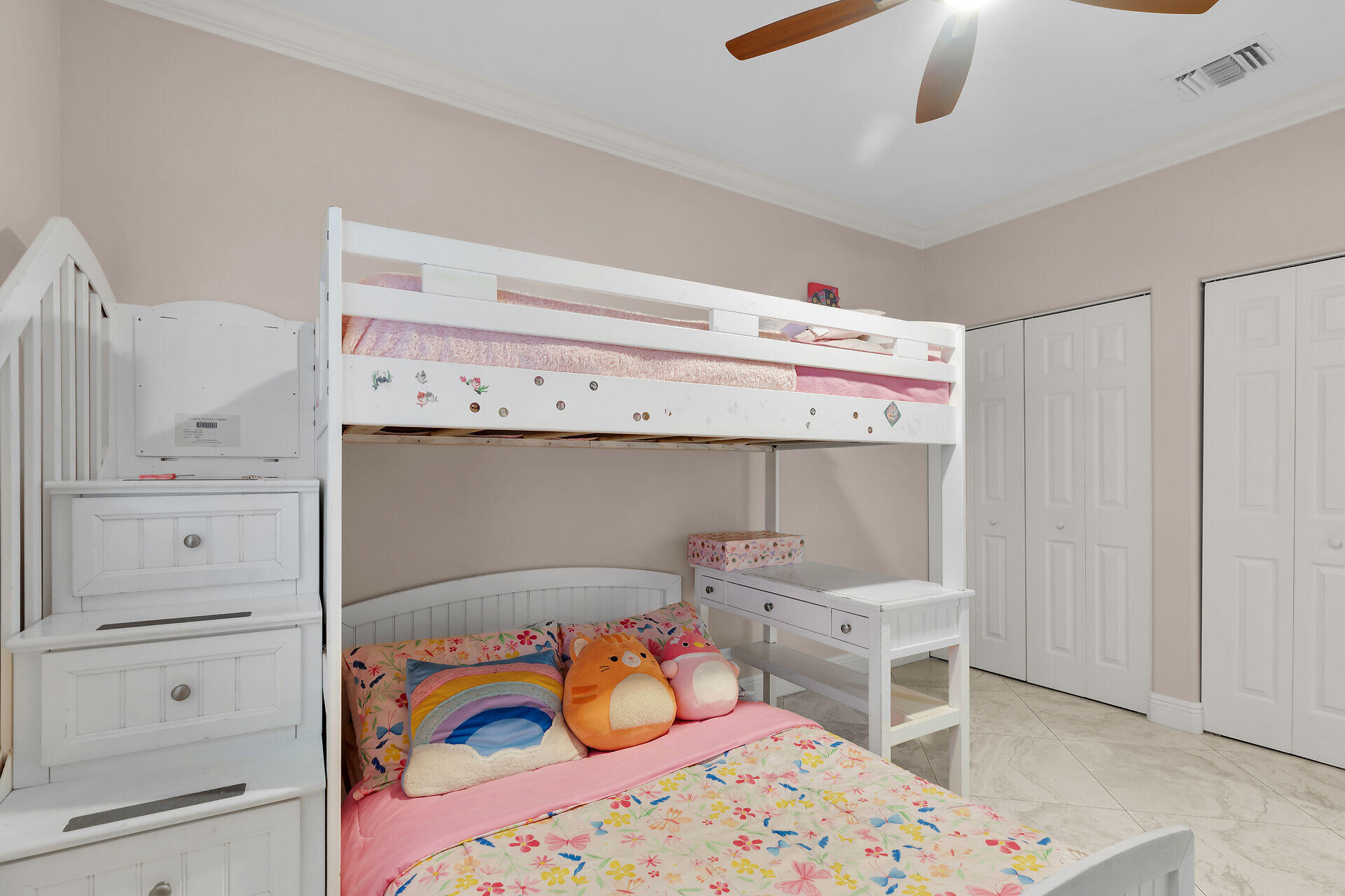 16 Jewfish Avenue Key Largo, FL 33037 - Photo 31 of 69 a bedroom with a bed and a cabinets