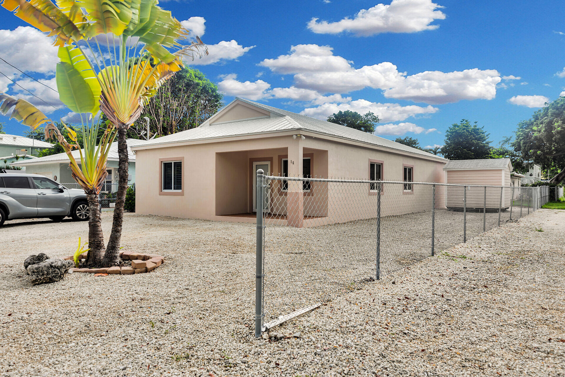 16 Jewfish Avenue Key Largo, FL 33037 - Photo 35 of 69 a view of a house with a backyard