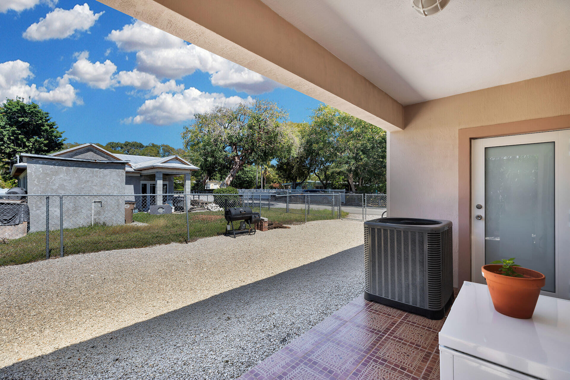 16 Jewfish Avenue Key Largo, FL 33037 - Photo 39 of 69 a house view with a sitting space and garden space