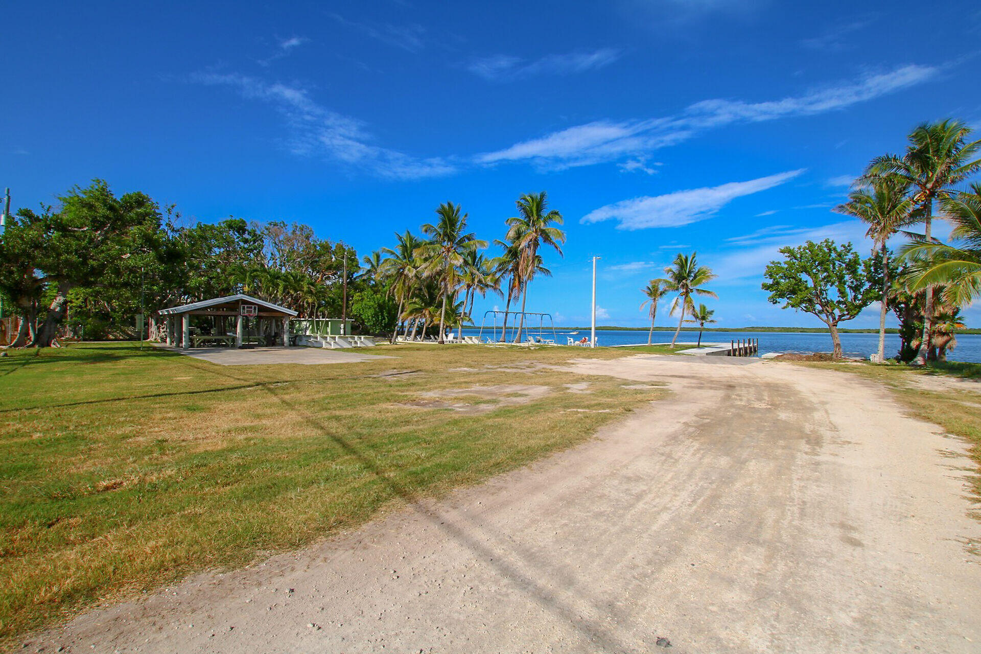 16 Jewfish Avenue Key Largo, FL 33037 - Photo 48 of 69 a front view of a house with a yard