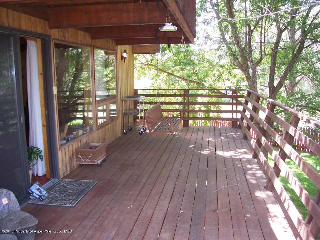 715 Buckeye Court Rifle, CO 81650 - Photo 11 of 16 a view of porch with wooden floor