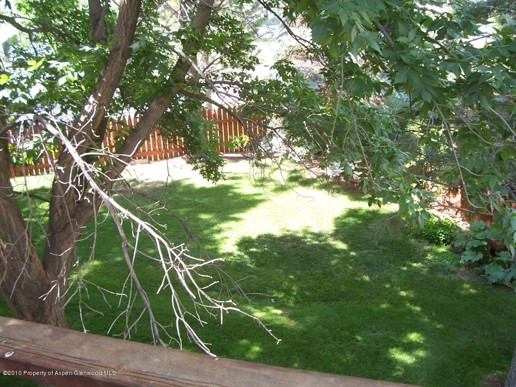 715 Buckeye Court Rifle, CO 81650 - Photo 12 of 16 a view of yard with green space