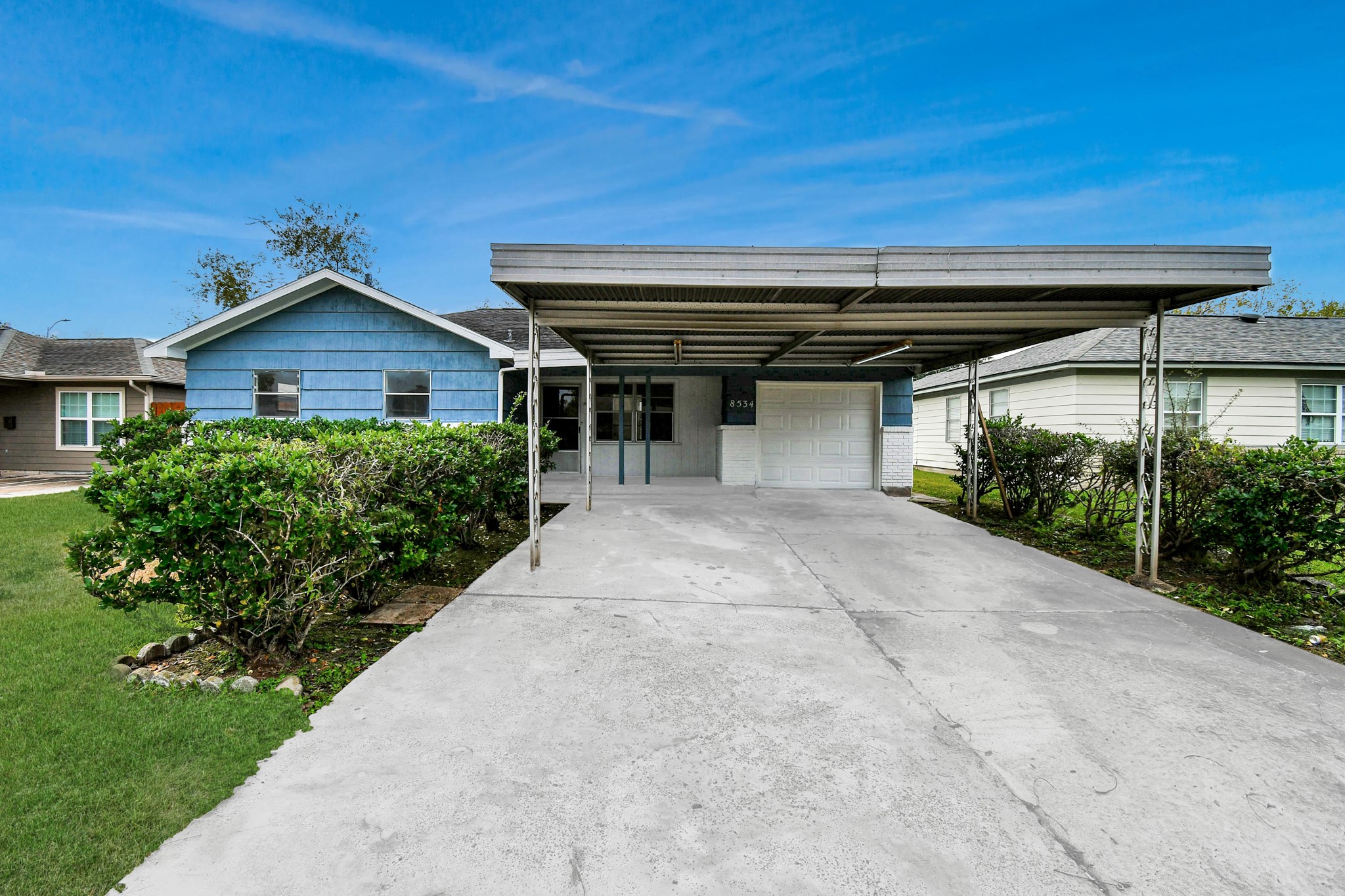 8534 Fillmore Street Houston, TX 77029 - Photo 3 of 39 Exterior view of the carport, offering covered parking and easy access.