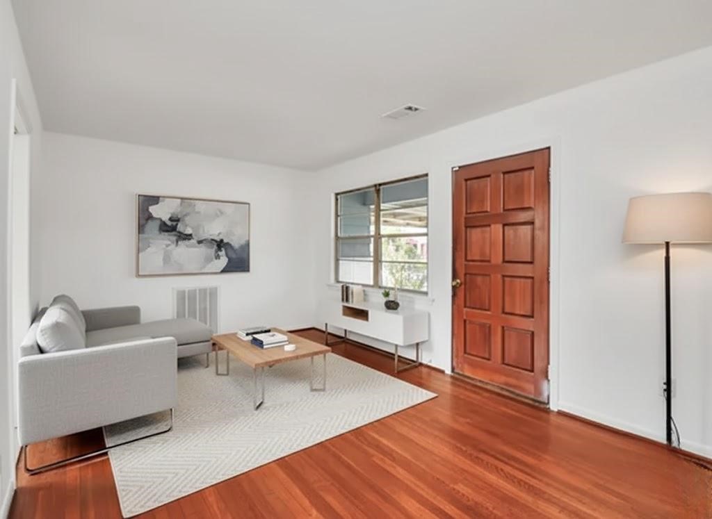 8534 Fillmore Street Houston, TX 77029 - Photo 6 of 39 Family room/den showcasing the layout—virtually staged to highlight its potential.
