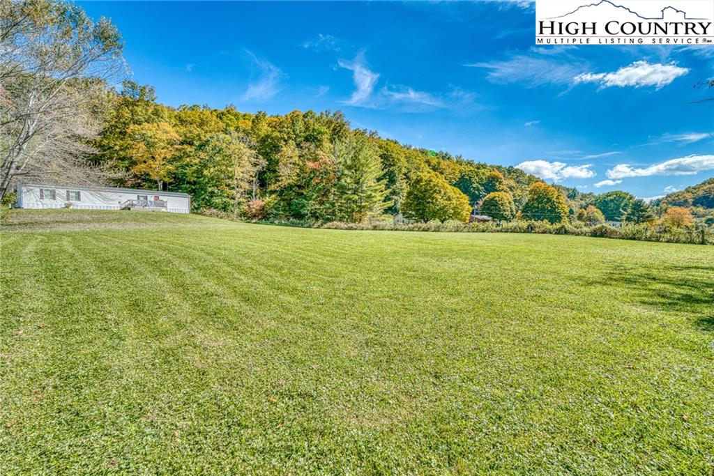 1310 Meat Camp Road Boone, NC 28607 - Photo 16 of 32 a view of a field with an ocean