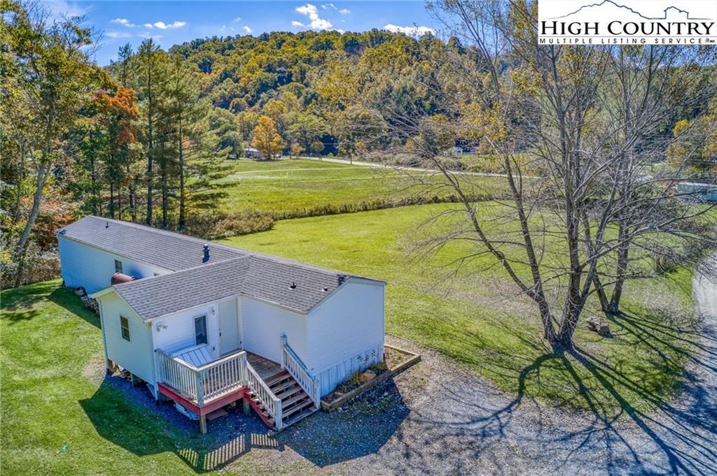 1310 Meat Camp Road Boone, NC 28607 - Photo 2 of 32 a aerial view of a house with big yard