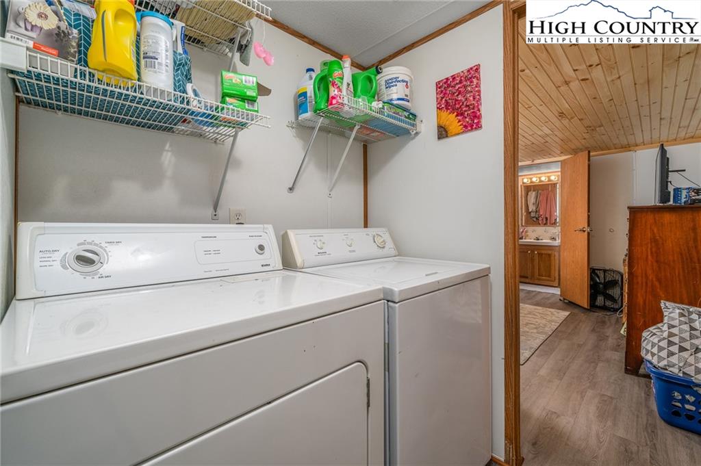 1310 Meat Camp Road Boone, NC 28607 - Photo 28 of 32 a utility room with dryer and washer